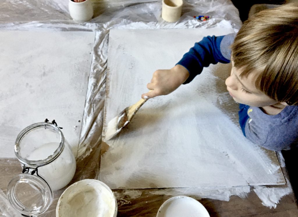 Preparing recycled material as painting surface